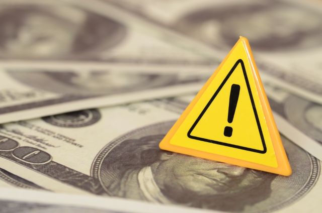 お札の上にある注意マーク